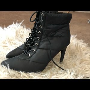 Black ankle boots. 4” heel, puffer jacket style.